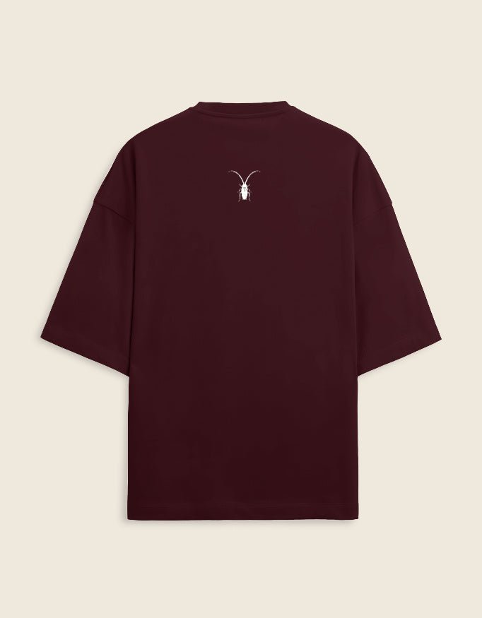 Back Premium maroon unisex oversized terry-knit t-shirt by Roach Resistance, featuring a relaxed drop-shoulder fit.