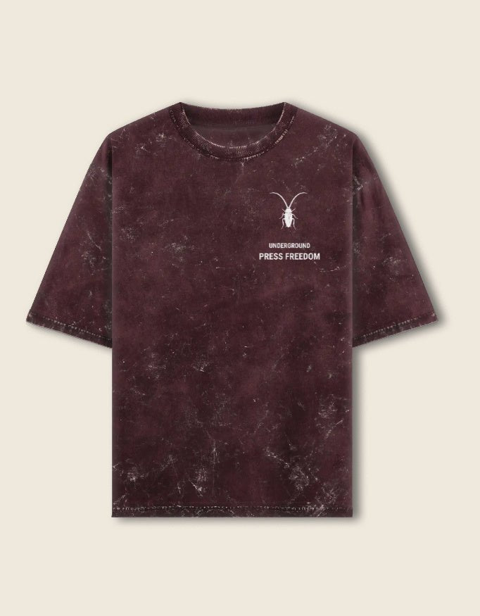 Front Premium maroon unisex oversized acid-washed t-shirt by Roach Resistance, featuring a relaxed drop-shoulder fit.