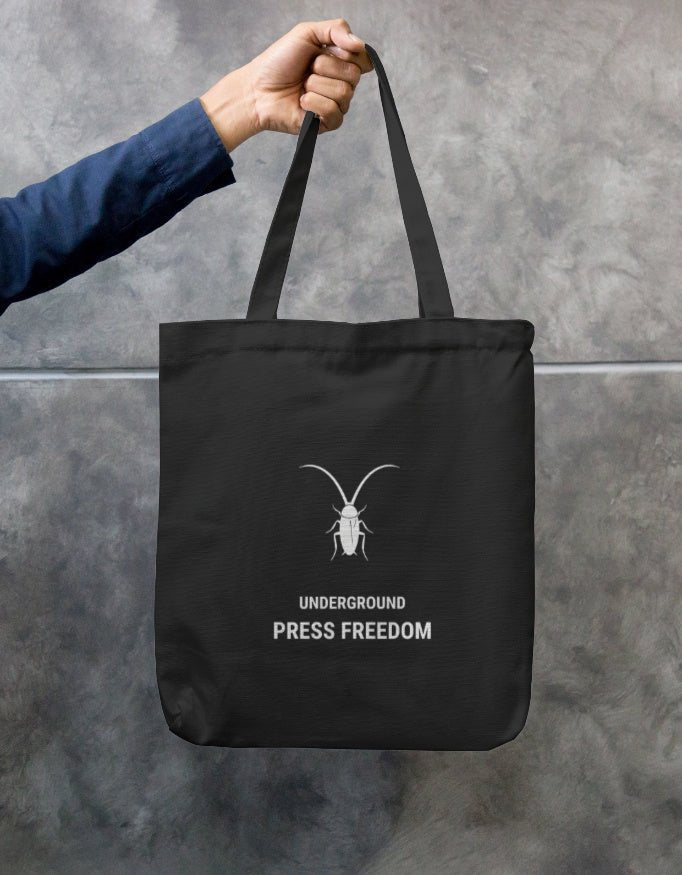Front Premium black cotton canvas zip tote bag by Roach Resistance featuring long double-stitched handles.