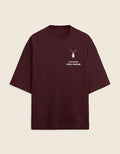 Front Premium maroon unisex oversized terry-knit t-shirt by Roach Resistance, featuring a relaxed drop-shoulder fit.