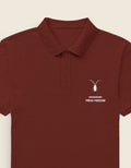 Left Crisp front view of the premium brick red textured cotton polo by Roach Resistance from the Press Freedom drop.