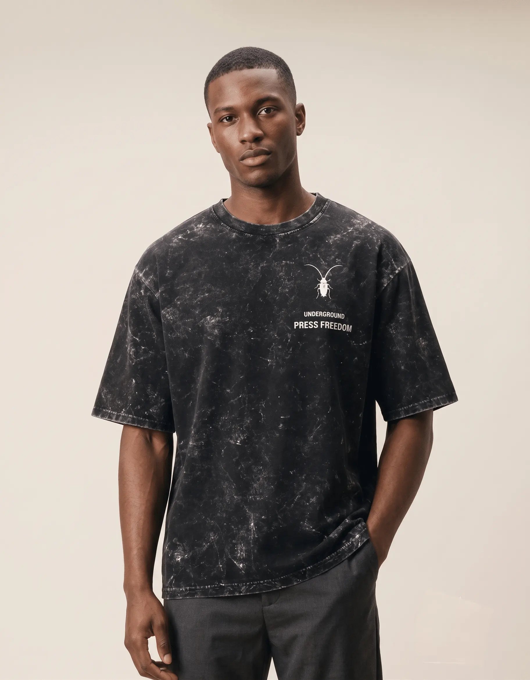 Premium unisex black acid-washed t-shirt by Roach Resistance from the Press Freedom collection, showcasing high-end heavy cotton texture.