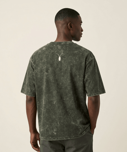 Premium regular fit unisex olive green acid-washed t-shirt by Roach Resistance from the Press Freedom capsule collection.back look