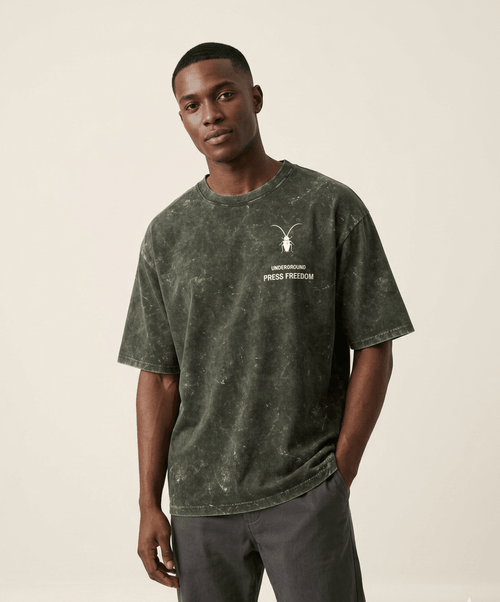 Premium regular fit unisex olive green acid-washed t-shirt by Roach Resistance from the Press Freedom capsule collection.