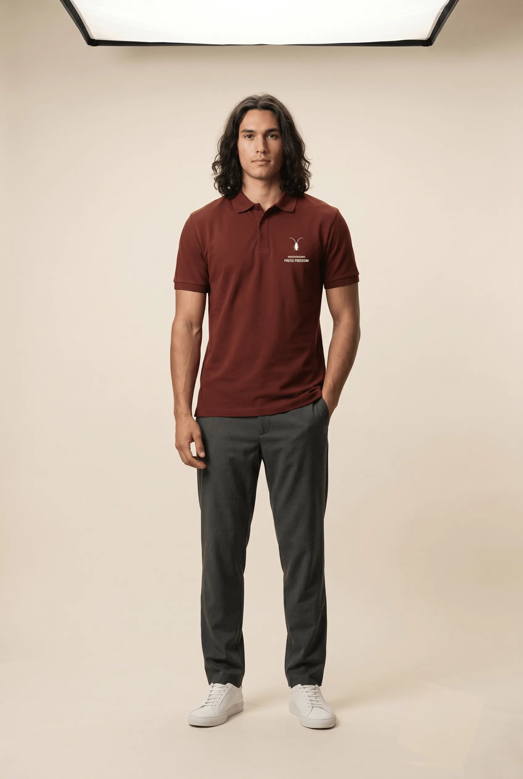 Crisp front view of the premium brick red textured cotton polo by Roach Resistance from the Press Freedom drop.