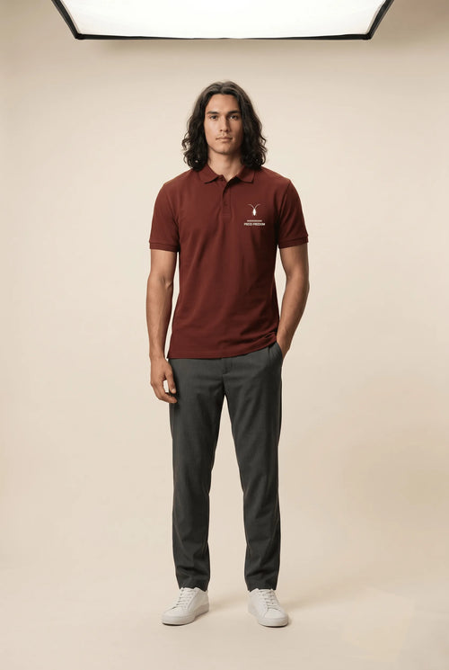 Crisp front view of the premium brick red textured cotton polo by Roach Resistance from the Press Freedom drop.