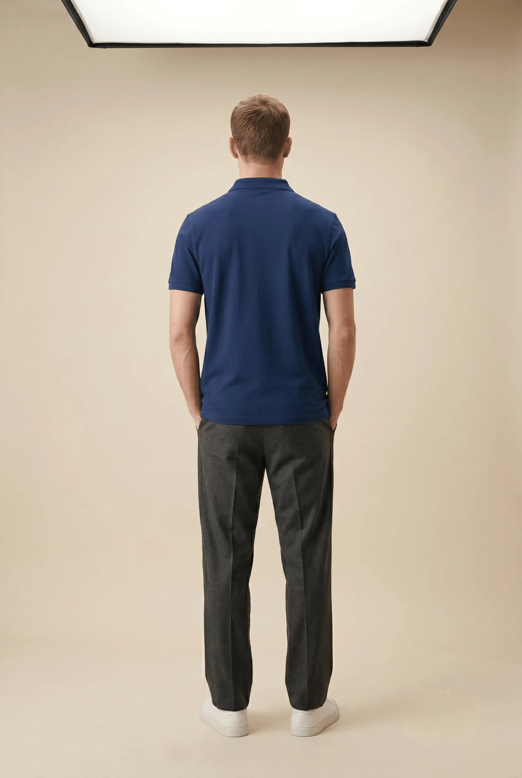 Men's premium royal blue polo shirt featuring a structured collar and textured 220GSM cotton by Roach Resistance.