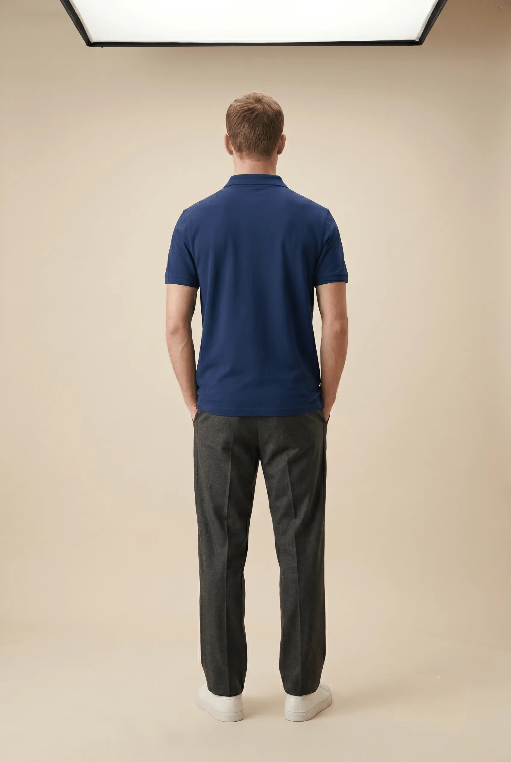 Men's premium royal blue polo shirt featuring a structured collar and textured 220GSM cotton by Roach Resistance.