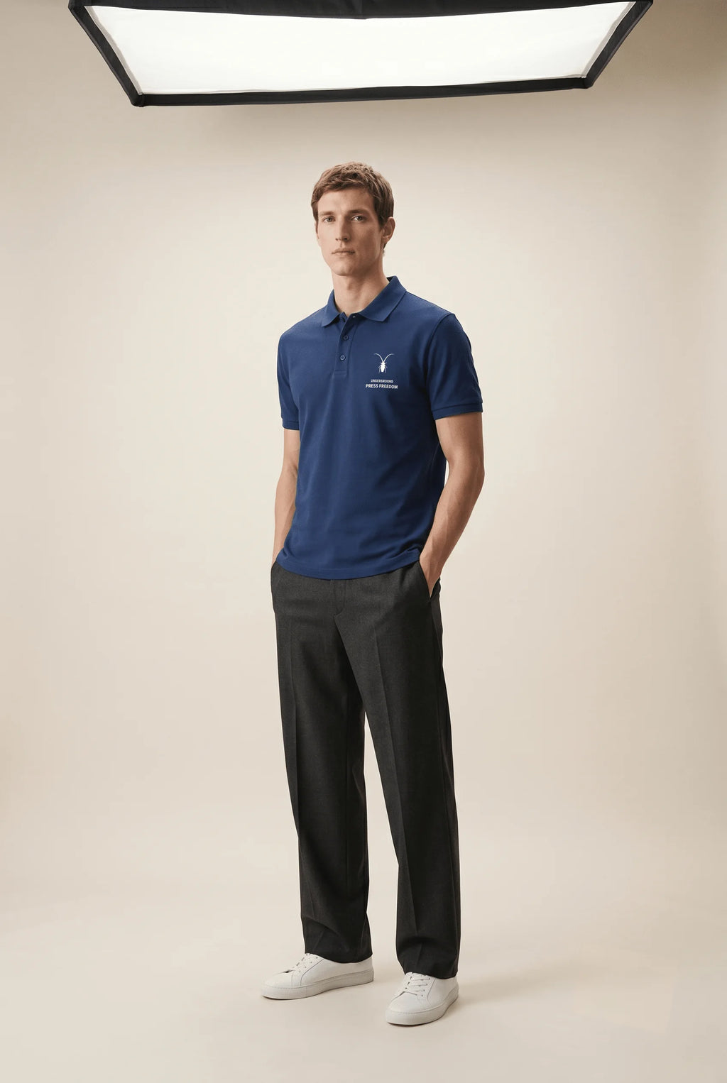 
Modern royal blue premium regular fit polo shirt showcasing the structured knit pattern by Roach Resistance.
