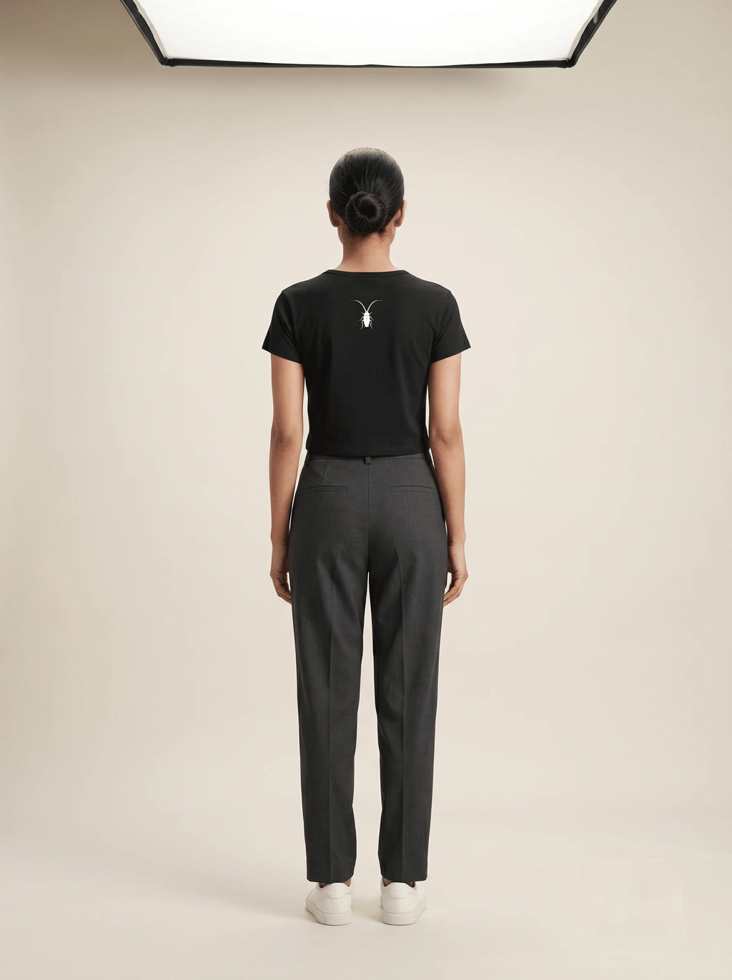 Back view of the premium 240GSM lavender cropped baby tee from the Roach Resistance Press Freedom collection.