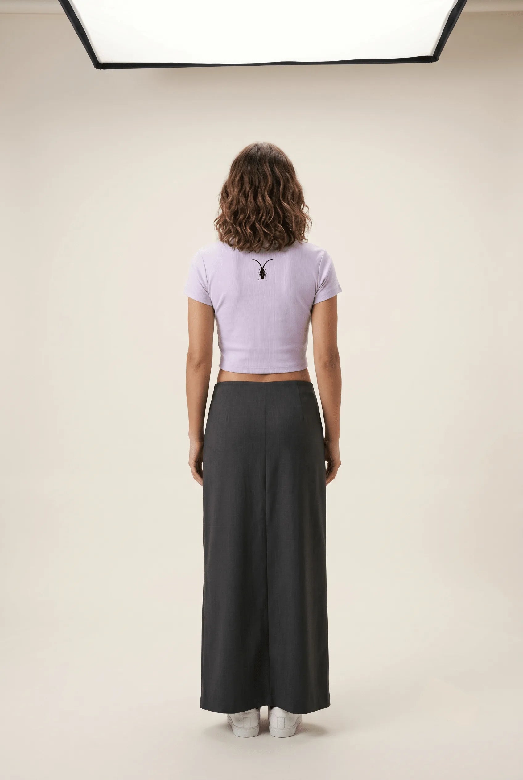 Back view of the premium 240GSM lavender cropped baby tee from the Roach Resistance Press Freedom collection.