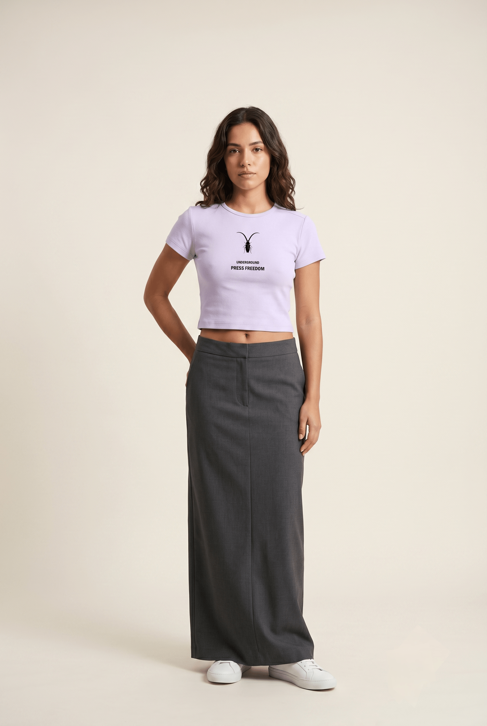 Front view of the Roach Resistance Press Freedom lavender baby tee for women, showcasing the fitted cropped silhouette.