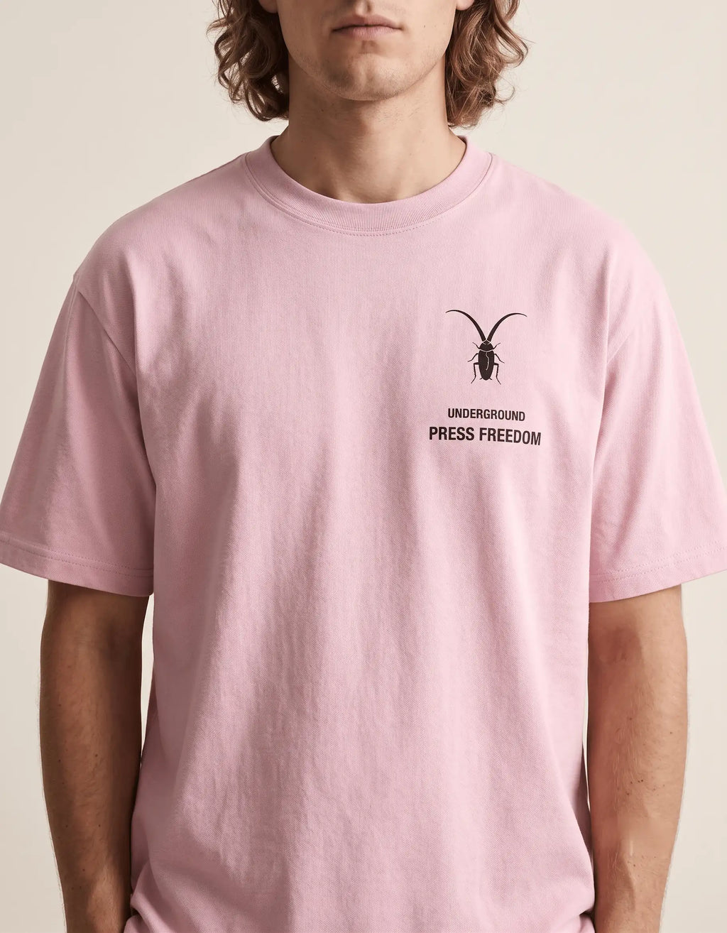  details Front view of the Roach Resistance Press Freedom light baby pink unisex stretch t-shirt, highlighting the clean, structured cotton-elastane fit.