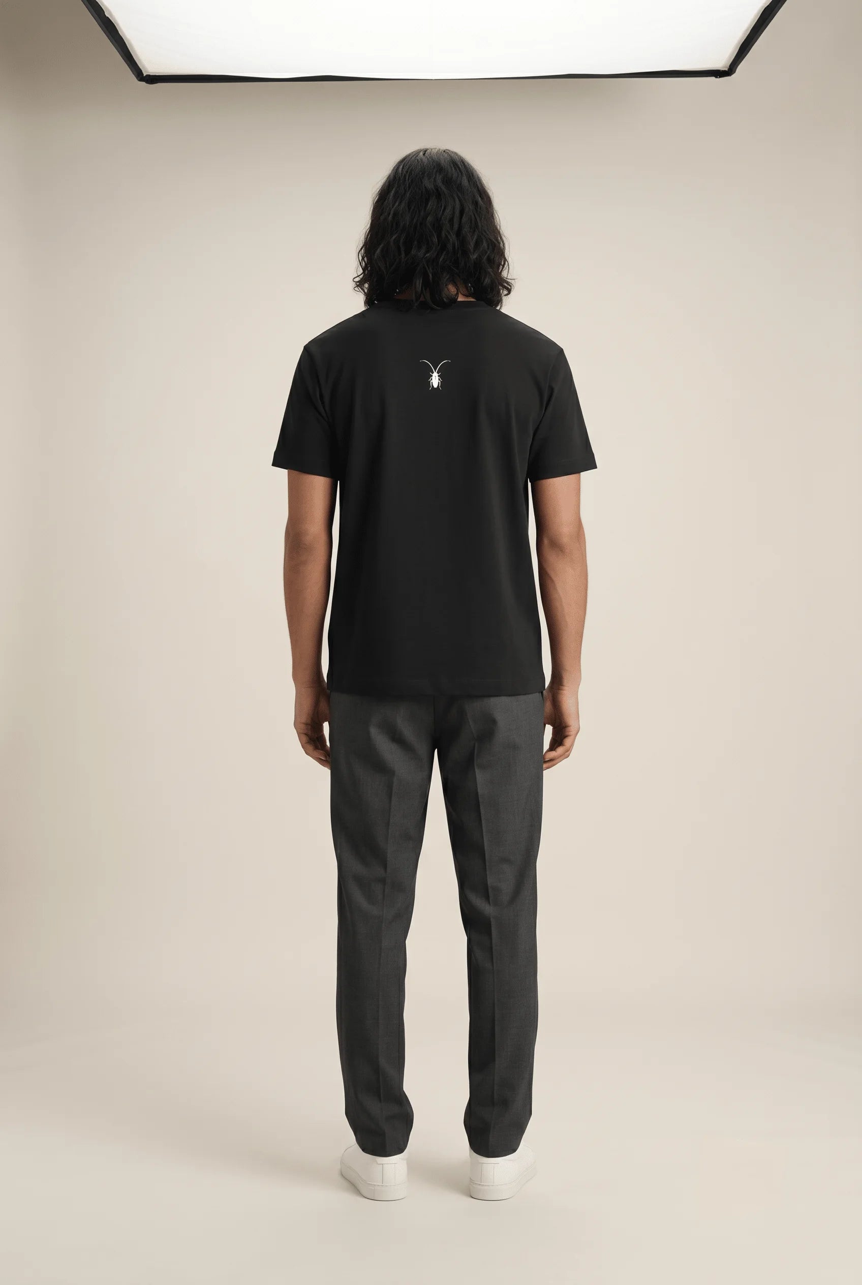 Premium unisex black t-shirt by Roach Resistance from the Press Freedom collection, showcasing back high-end Supima cotton texture.