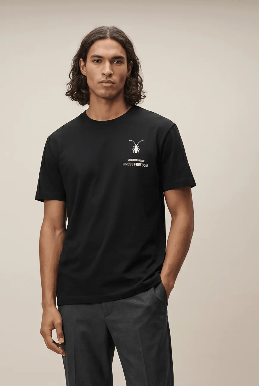Premium unisex black t-shirt by Roach Resistance from the Press Freedom collection, showcasing back high-end Supima cotton texture.