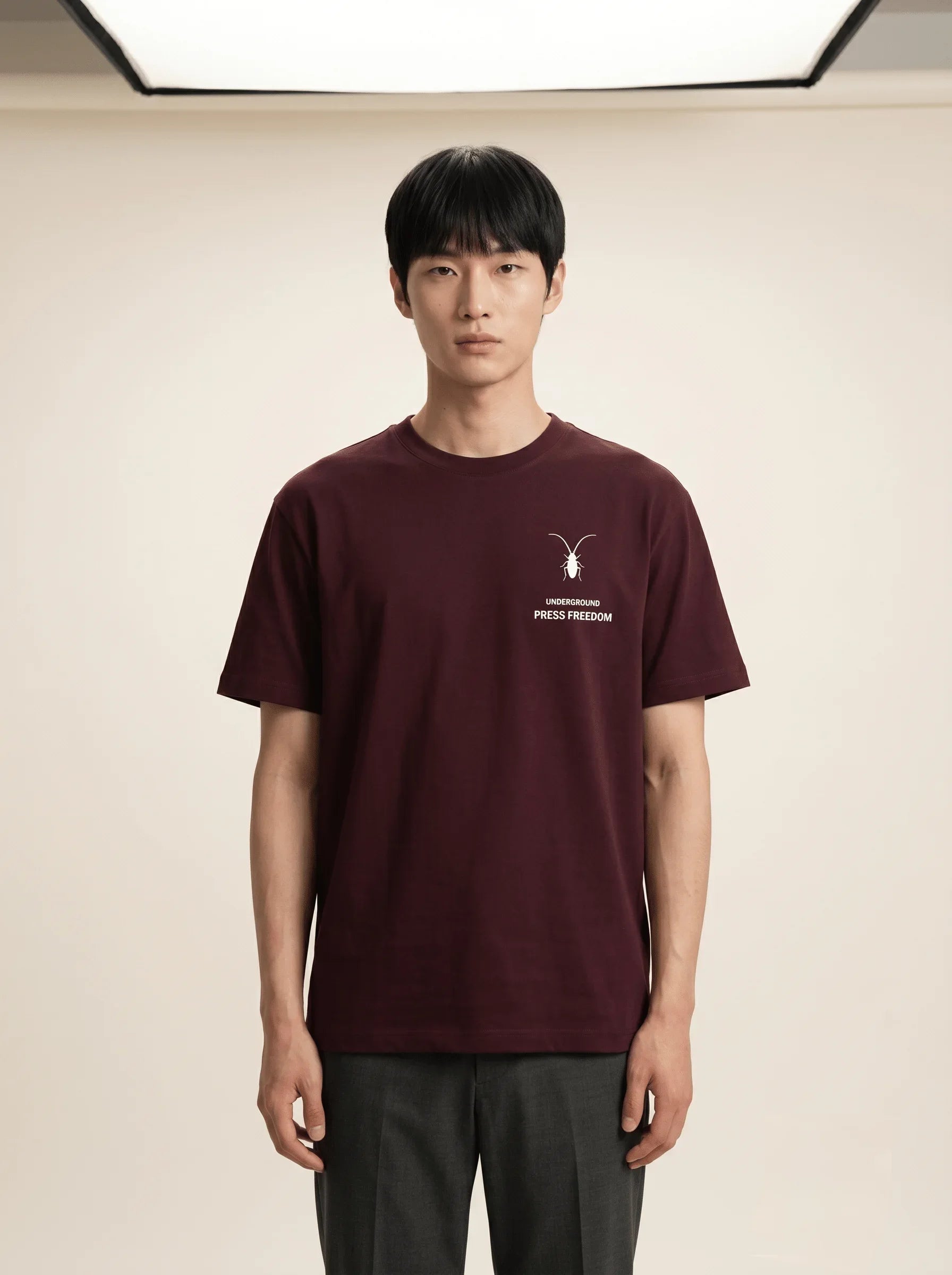 A minimalist regular fit unisex maroon t-shirt by Roach Resistance from the Press Freedom drop, featuring luxury Supima cotton.