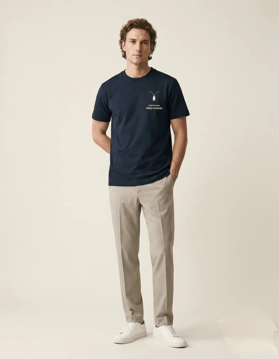 Clean studio shot of a classic Roach Resistance unisex navy blue regular fit t-shirt from the Press Freedom collection.