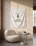 The Roach Resistance Press Freedom tapestry hung in a modern creative space, showcasing its large-scale streetwear aesthetic