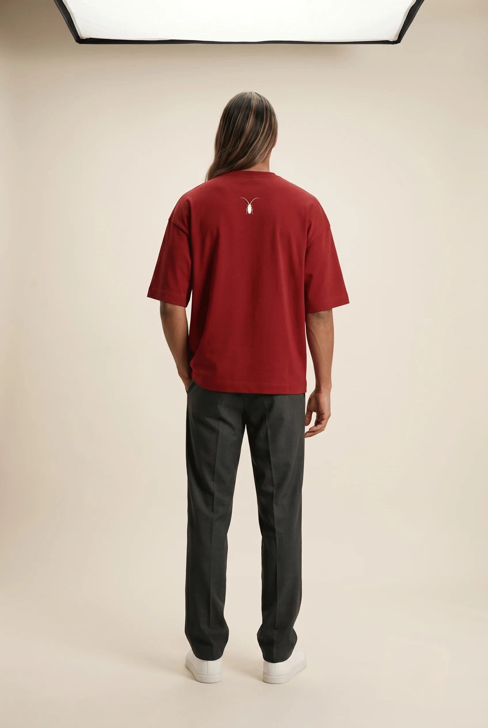 Bold red unisex oversized t-shirt with drop shoulders from the Roach Resistance Press Freedom collection. back look