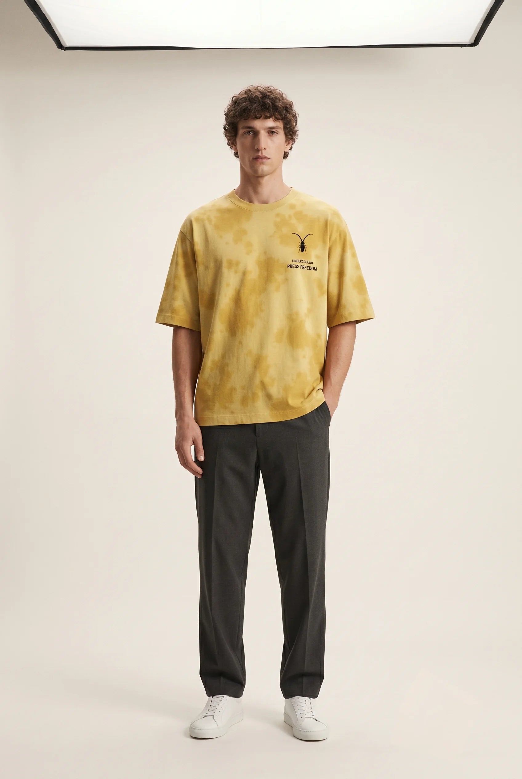 Front view of the Roach Resistance Press Freedom unisex oversized tie-dye t-shirt in bold yellow, crafted from heavy 260GSM cotton.